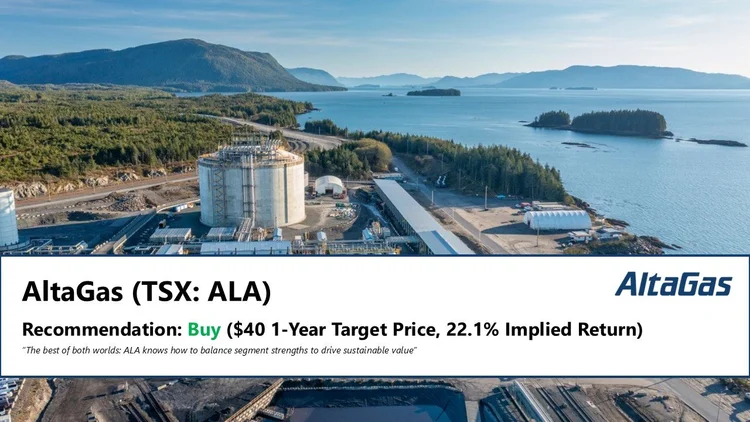 An aerial view of a gas processing plant near a body of water, surrounded by forested landscape and mountains in the distance.
